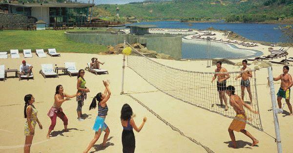 Aamby Valley City Лонавала Экстерьер фото Beach volleyball at Lake Cascade