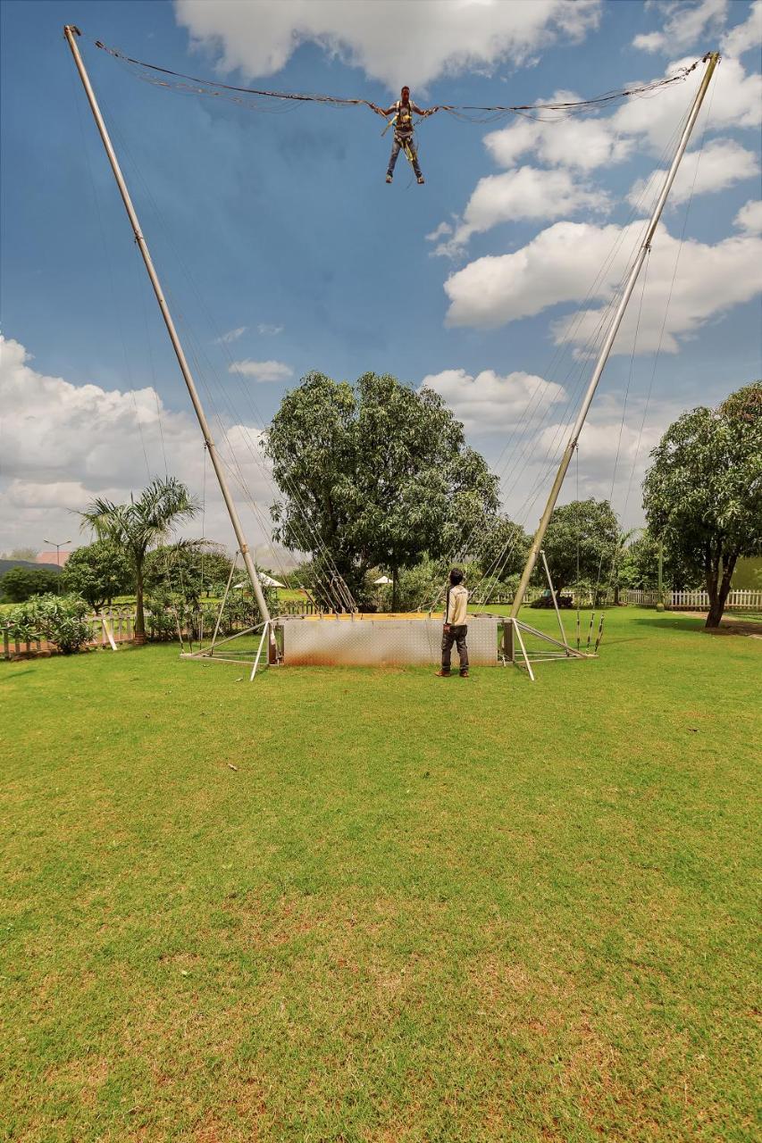 Aamby Valley City Лонавала Экстерьер фото The trampoline at the park